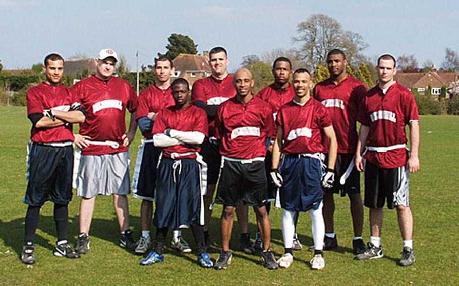 RAF Mildenhall-based airmen who play for the Mildenhall Mayhem pose for a picture. Front row, from left, are Tre Moorer, Stacy Cochran and Mike Dedousis. Back row, from left, are Brian Dillard, Jeff Butler, Jared Flores, Bob Black, Damion Lee, Byron Washington and Robert Trace.
