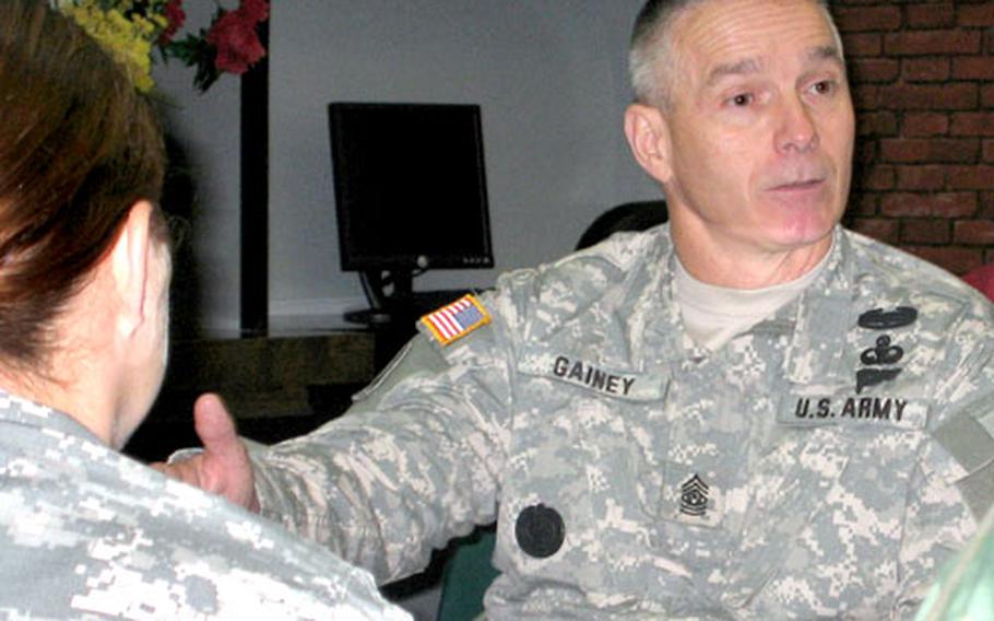 Army Command Sgt. Maj. William J. Ganey, senior enlisted advisor to the chairman of the Joint Chiefs of Staff, talks with servicemembers during breakfast at Kadena Air Base on Wednesday.
