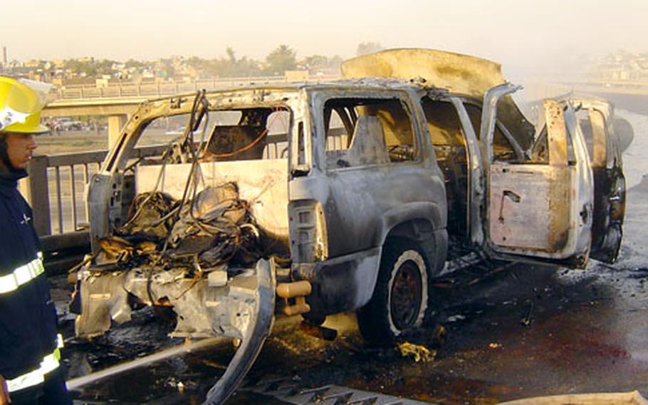 A private contractors’ vehicle was hit by a roadside bomb, killing three men in May 2005.