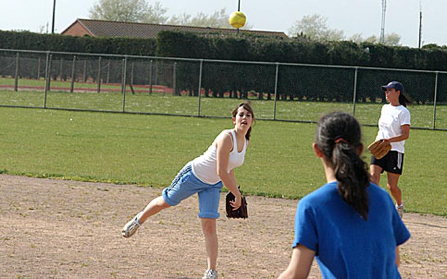 With a young team this year, members of the Alconbury Dragons softball team, like sophomore Megan Cash, are learning to gel with one another others are just learning the fundamentals of the game.