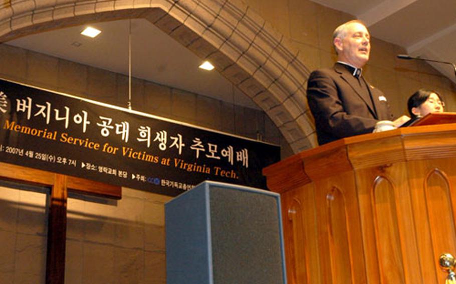 U.S. Forces Korea command chaplain Col. Samuel Boone delivers a speech during a memorial service in Seoul for victims of the Virginia Tech shootings.