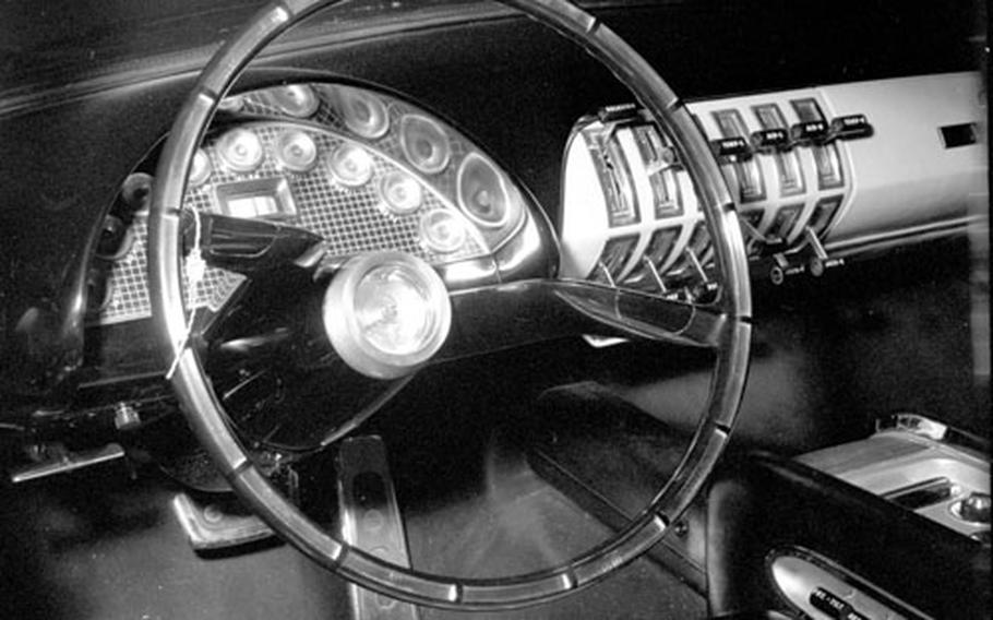 The console includes switches for such features as the telephone and the automatic jacks for each tire.