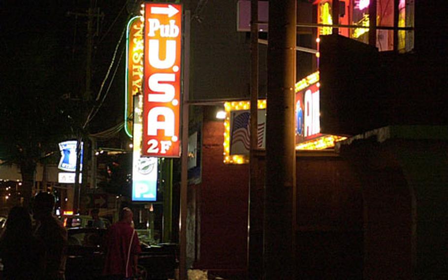 Camp Foster staff noncommissioned officers walk Kitamae Street from 11 p.m. to 1 a.m. Friday and Saturday nights as part of a courtesy patrol program to provide a leadership presence during off-duty hours, said Col. Russ Jones, Headquarters and Service Battalion commander.