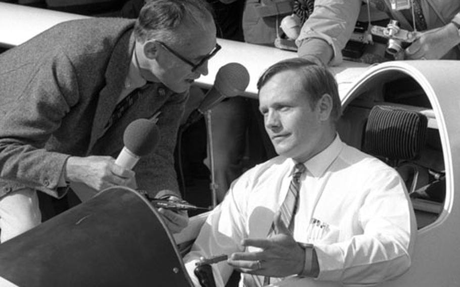 Neil Armstrong is interviewed while seated in the cockpit of a glider at Gersfeld, Germany, in August, 1970.