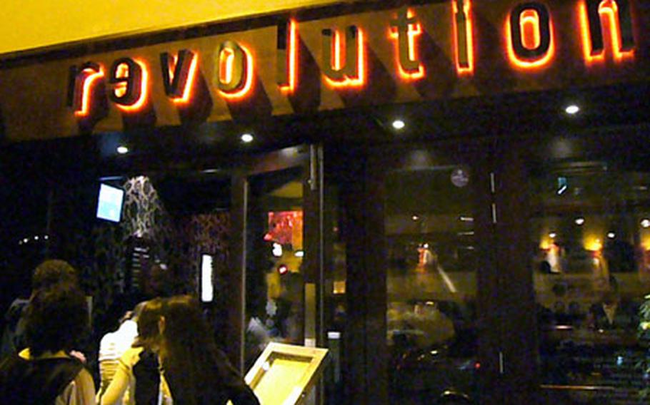 Outside the Revolution bar in Cambridge.