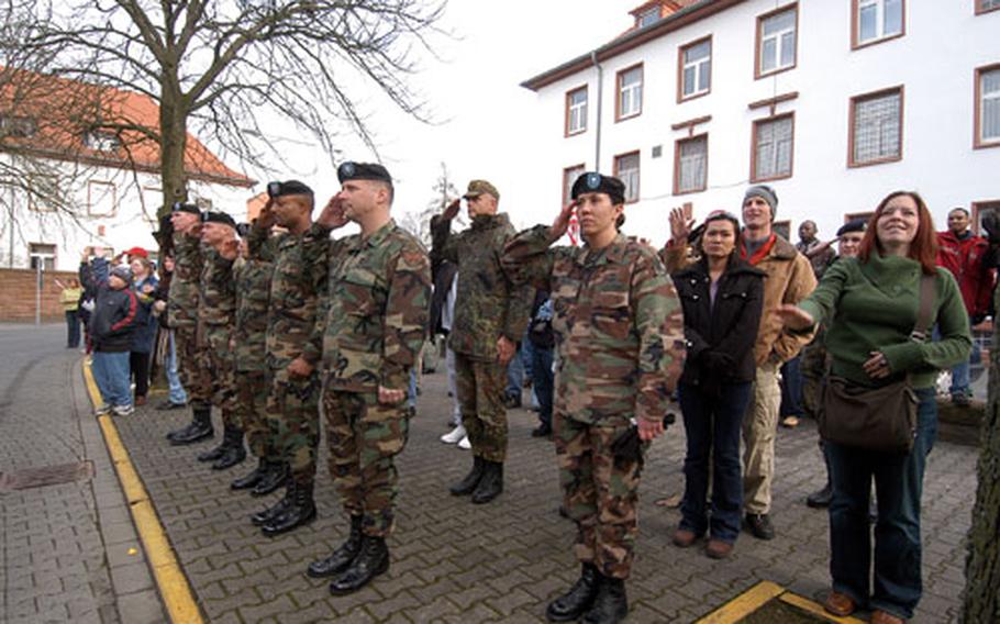 Family members, friends and fellow soldiers bid the 578th Signal Company goodbye as they leave Darmstadt, Germany&#39;s Cambrai-Fritsch Casen on their way to an Iraq deployment.
