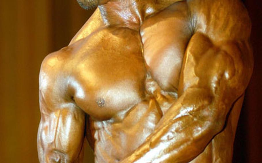 12th Far East Bodybuilding Competition men&#39;s lightweight and overall champion Tomoya Nakanomari of Okinawa.