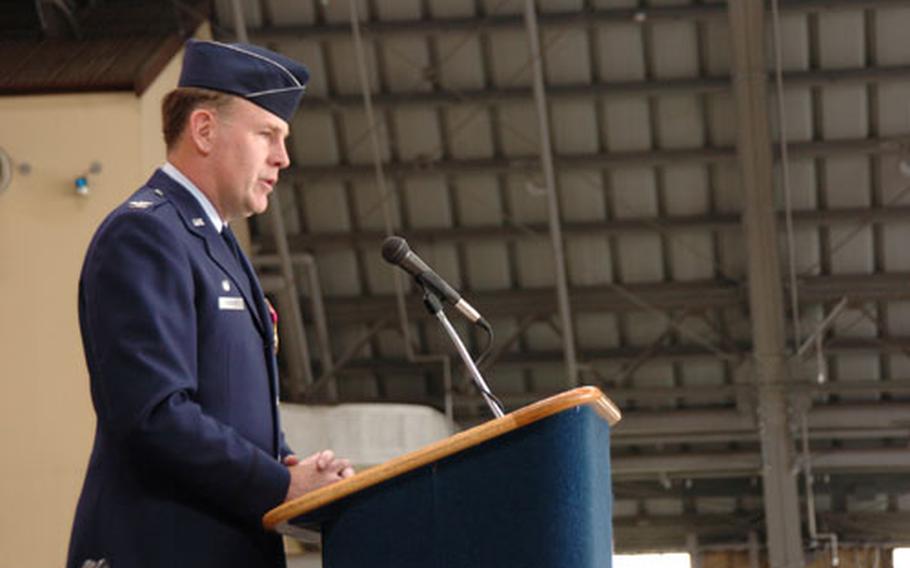 Col. Scott P. Goodwin gives a tearful goodbye speech during a change of command ceremony in front of local Japanese officials, airmen and their families. Airmen from the 374th Airlift Wing Command were gathered to participate.