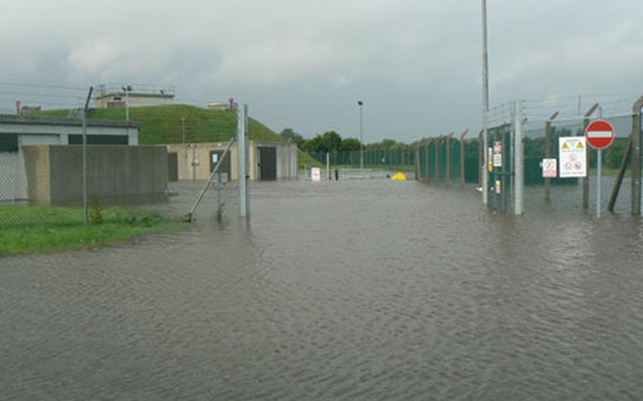 One of RAF Fairford's fuel operations compounds submerged by rainwater on Saturday.
