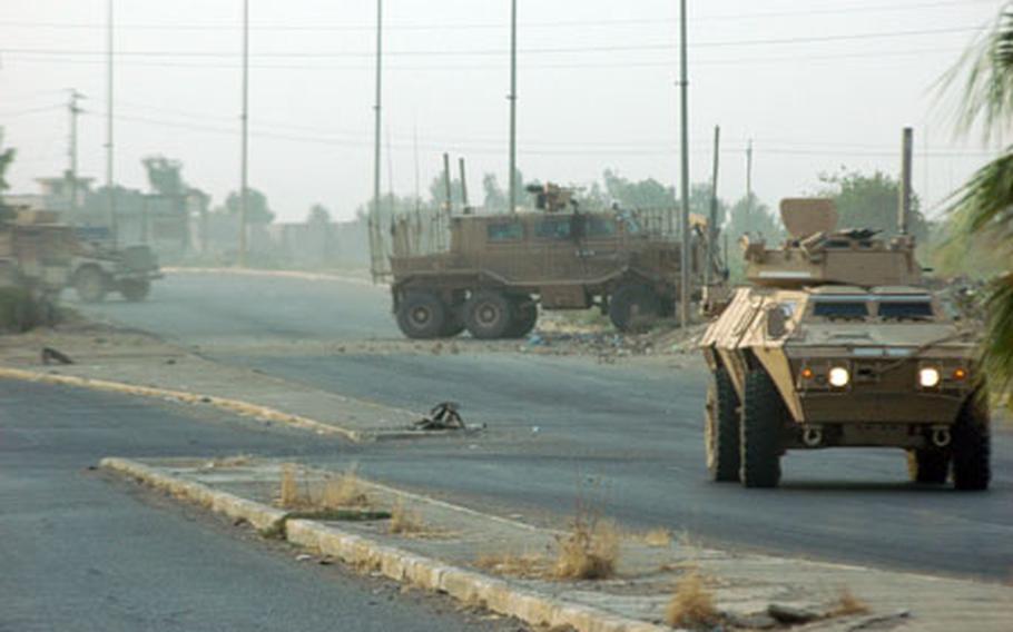 A buffalo is seen in the streets of Mosul on Friday after the dust settled from a recently exploded roadside bomb. None of the men in the vehicle were injured, but they were all taken to see medical personnel following the explosion. The truck was damaged beyond the point of carrying out its duties and was returned to base for repairs.