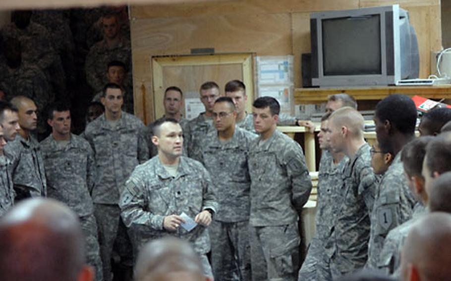 Lt. Col. John Reynolds, who recently took over as commander of the 1-26, talks to his soldiers on Saturday. The unit is expected to leave Iraq by the end of October.