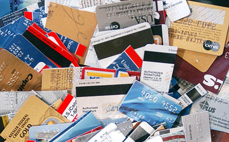 A jar of cut-up credit cards, once belonging to victims of identity theft and various other financial troubles, sit in an office inside RAF Lakenheath's Airman and Family Readiness Center. The center recently initiated an identity theft class to prevent further cases on the base.