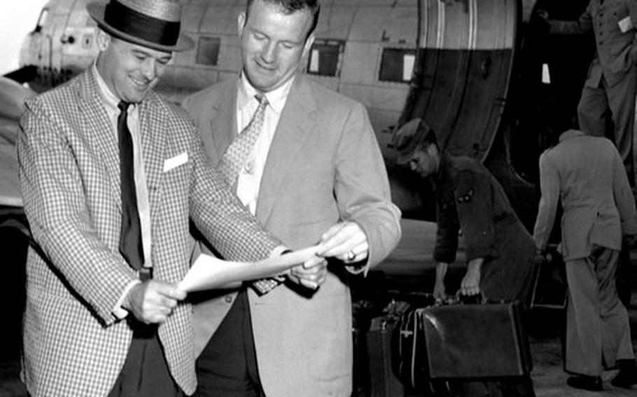 Notre Dame coaches George Dickson, left, and Terry Brennan.