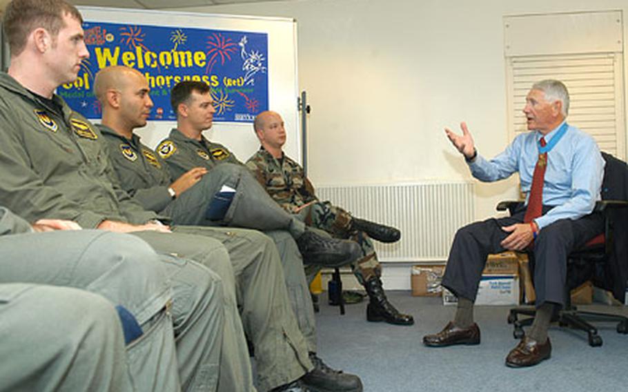 Medal of Honor recipient retired Col. Leo Thorsness shares his story and life lessons to an attentive crowd inside the RAF Lakenheath library as part of his visit to the base last week.