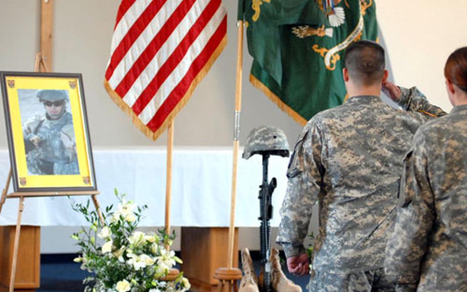 A final salute for Spc. Matthew Murchinson, who was killed in Iraq on Aug. 4. Mourners filled the Pioneer Casern chapel in Hanau, Germany, on Tuesday for the ceremony for the 127th Military Police Company, 709th MP Battalion soldier.