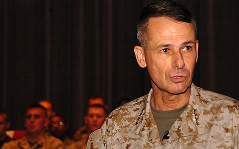 Marine Corps Gen. Peter Pace, chairman of the Joint Chiefs of Staff, conducts a town hall meeting Friday at Yokota Air Base, Japan, with U.S. servicemembers from installations across the Kanto Plain.