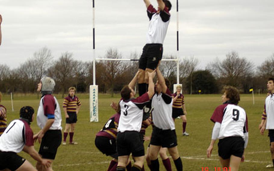 Matthew Edison reaches for the ball during a lineout.