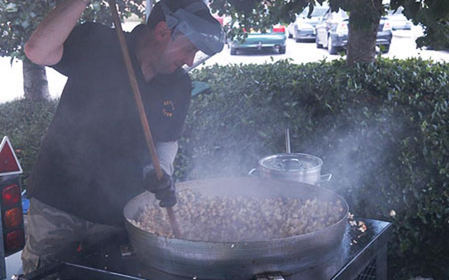 Peter Martin cooks a batch of kettle corn outside the RAF Lakenheath BX.