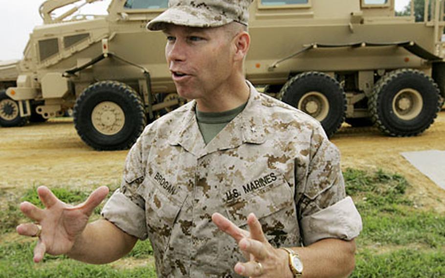 Marine Corps Brig. Gen. Michael Brogan speaks to members of the media following a demonstration of mine resistant ambush protected (MRAP) vehicles Friday at Aberdeen Proving Ground, Md.