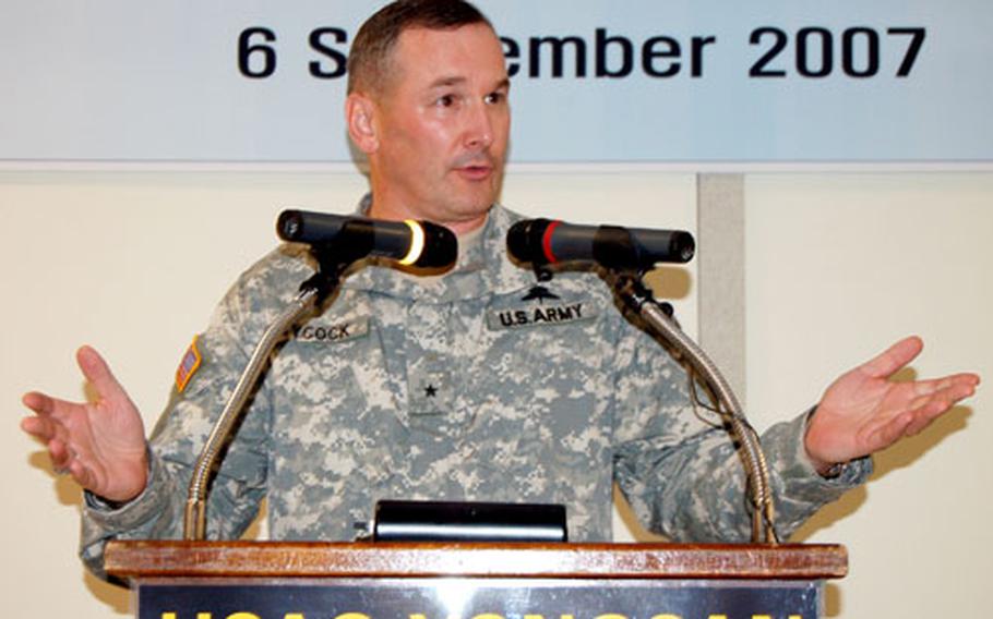 Brig. Gen. Al Aycock, regional director of the Installation Management Command, Korea, speaks during the opening ceremony of an officer housing unit at K-16 Air Base on Thursday.