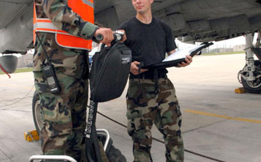 A member of the 51st Fighter Wing Maintenance Squadron at Osan Air Base rides one of 10 new Segways purchased to reduce travel time to and from hangars.