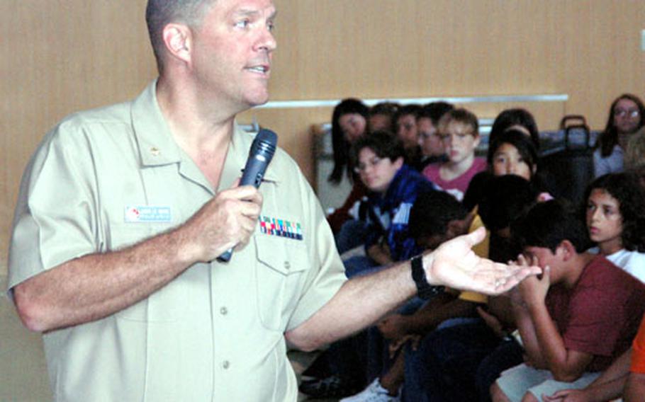 U.S. 7th Fleet Judge Advocate General Lt. Cmdr. Chuck Lemoyne spent about twenty minutes discussing the U.S. Constitution with 7th- and 8th-grade students at Yokosuka Middle School on Wednesday.