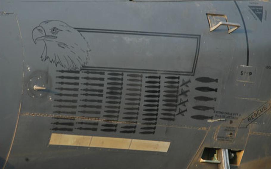 A collection of painted bombs adorn the side of a F-15E assigned to RAF Lakenheath-based 492nd Fighter Squadron. The paintings represent the number of bombs each jet has launched while deployed to Afghanistan.