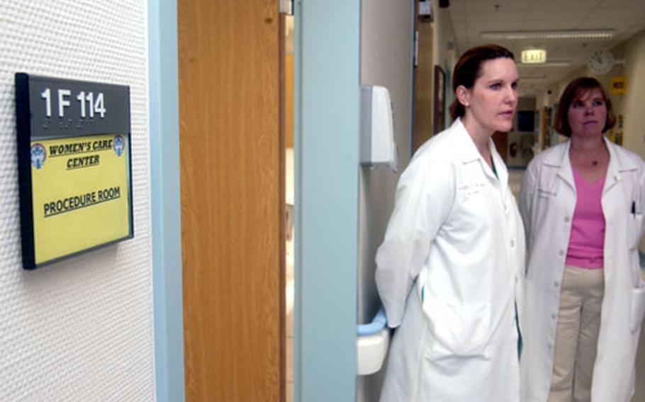 Air Force Maj. Elizabeth Decker, left, and Dr. Kay Vandenberg stand outside a procedure room at the Landstuhl Women’s Care Center, which is finally settling into its permanent home at the hospital.