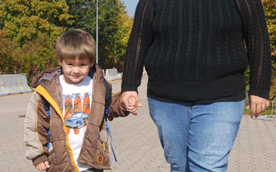 Vilseck mother Jennifer Cranfield walks with her son Bradley, 4, who has autistim, a condition that affects an estimated one in 150 children.
