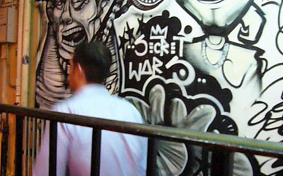 Outside the Juno bar, in London&#39;s Shoreditch area. The bar plays host to art competitions on selected nights.