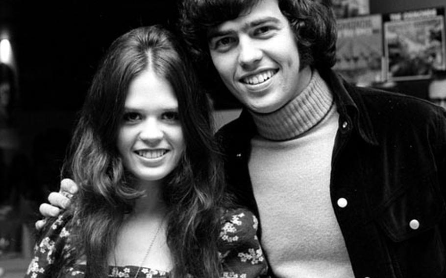 Alan Osmons with his sister Marie, 13.