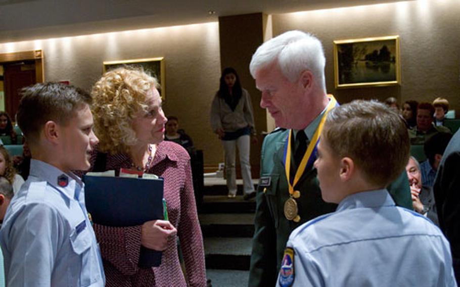 Lt. Col Walter Bradley, a Vietnam veteran who deployed as a reservist to Afghanistan, speaks with attendees at the 10th annual American Veterans Center convention in Washington.