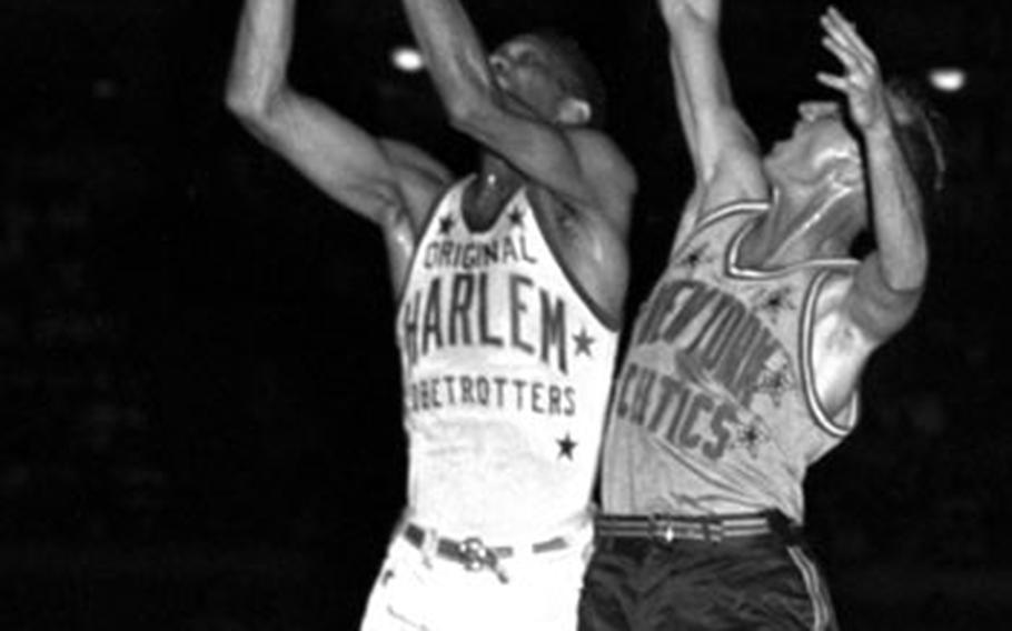 The Harlem Globetrotters take on the New York Celtics as their world tour makes a stop in Frankfurt, Germany, in 1952.