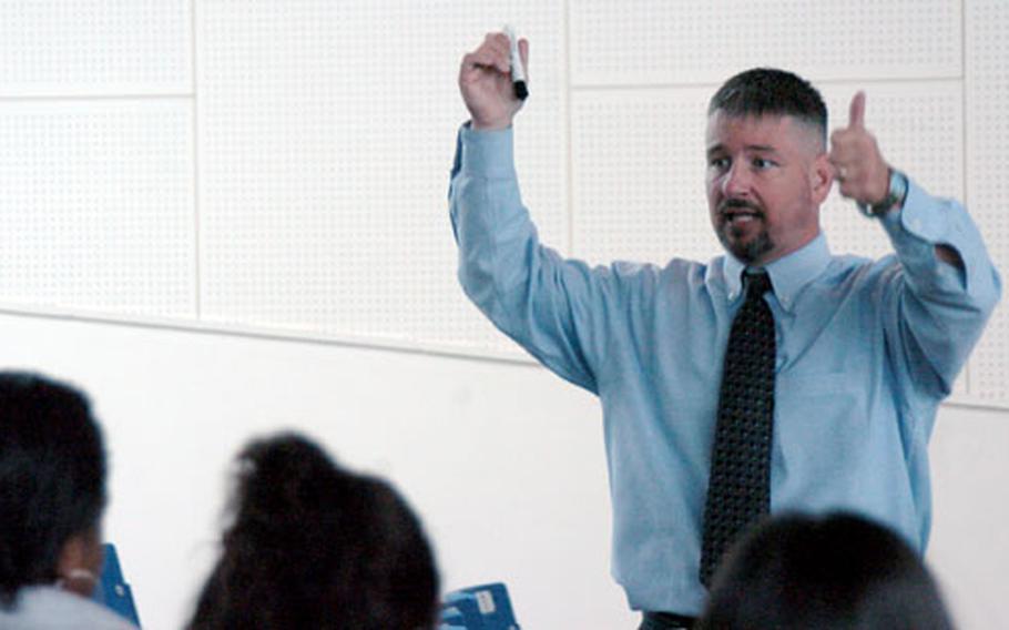 Hugh Clark, coordinator for the Yokota Conduct Adjudication Program (YCAP), gives an alcohol-abuse prevention lecture at Yokota High School on Wednesday.