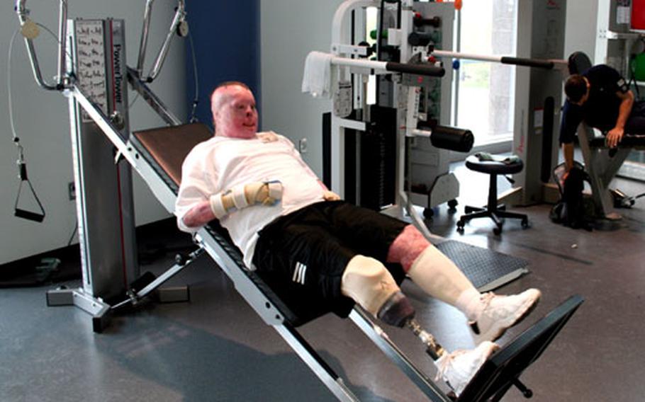 Army. Spc. Richard Yarosh performs squat exercises at the new gym in the Center for the Intrepid. Yarosh lost his right lower leg and suffered burns over 60 percent of his body in when an IED attack in North Baghdad ignited his Humvee’s fuel cell.