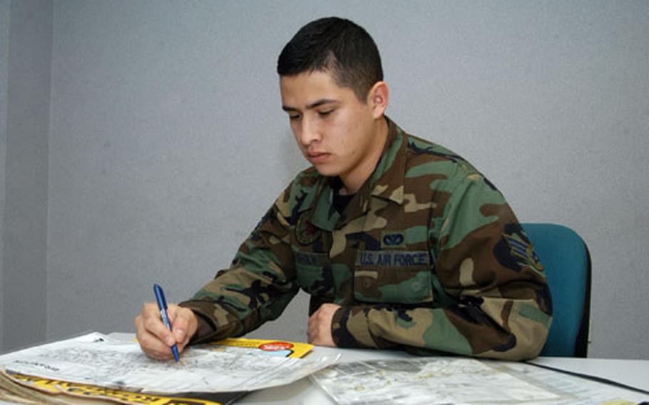 Senior Airman Robert Lysholm maps out the route that he and other volunteers use to deliver to meals to the elderly as part of Brandon's meals on wheels program. The RAF Mildenhall firefighter is currently looking for more volunteers at Mildenhall and other bases to assist in the program’s efforts every Tuesday, except the first Tuesday of each month which is set aside for Mildenhall’s fire station.