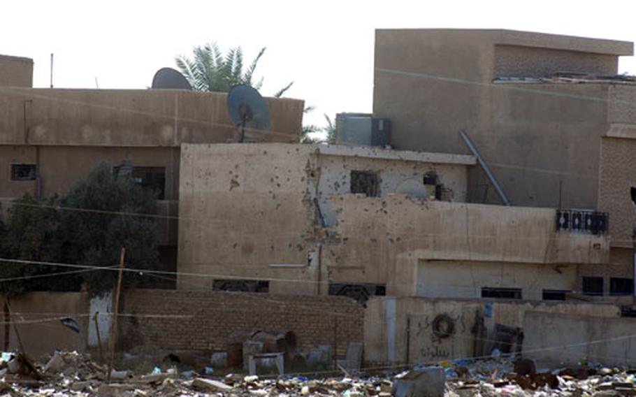 Many buildings in Hadar are scarred by warfare that took place in September when soldiers from 3rd Squadron, 2nd Cavalry (Stryker) Regiment cleared the area of insurgents.