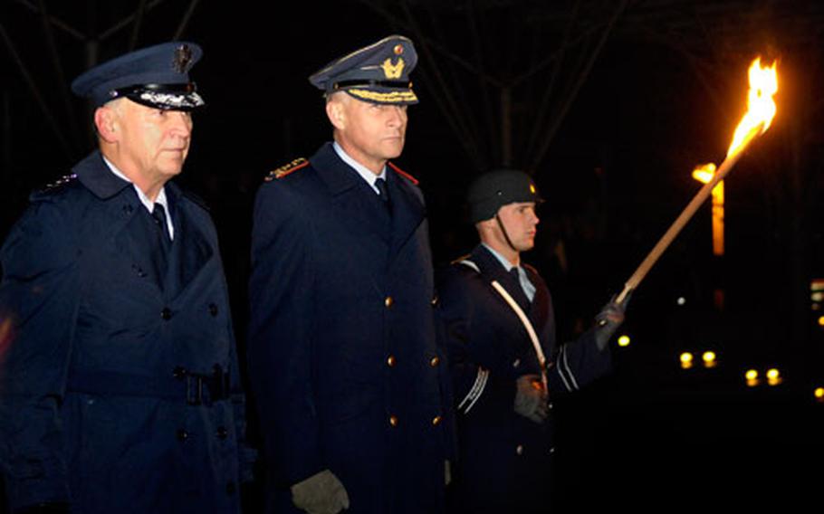 Hobbins and Lt. Gen. Klaus-Peter Stieglitz, the German Air Force Chief of Staff, view the formation during a formal Grand Tattoo ceremony held in Hobbins’ honor Thursday at the Ministry of Defense in Bonn, Germany.