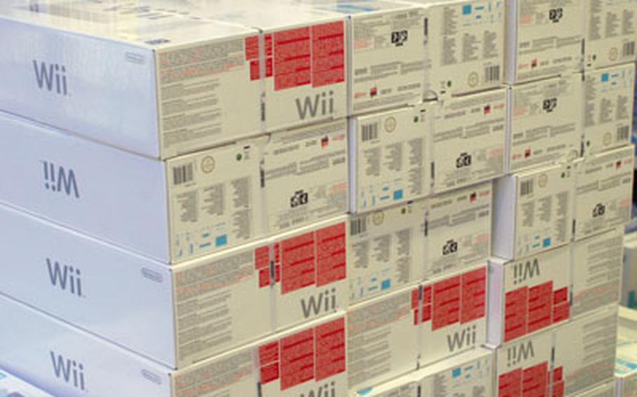A small mountain of Nintendo Wii video game consoles dominates the video game aisles at the Saturn electronics store in Darmstadt, Germany. Similar piles of Wii consoles, which are nearly impossible to find in the United States or at military exchange stores, have been sighted across Germany.