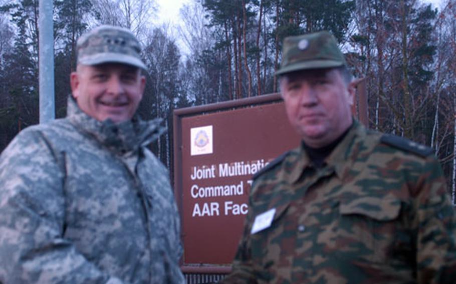 Lt. Gen. Kenneth Huntzeker, commander of the U.S. Army's V Corps, left, and Lt. Gen. Vladimir Chirkin, deputy commander of the Russian army's Moscow Military District, were getting to know each other at Grafenwöhr, where the two armies were conducting a joint exercise designed to enhance any future joint operations and form friendly military ties.