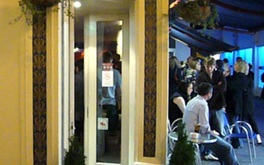 Outside Ta Bouche bar in Cambridge's city center.