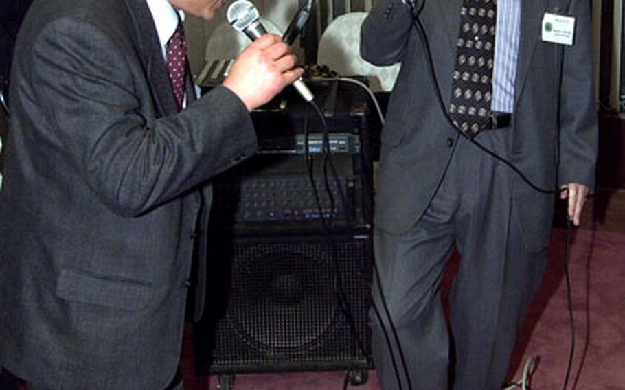 David McCracken, a retired Army sergeant major and Vietnam War veteran, sings karaoke during a dinner with the Vietnam Veterans of Korea last week.