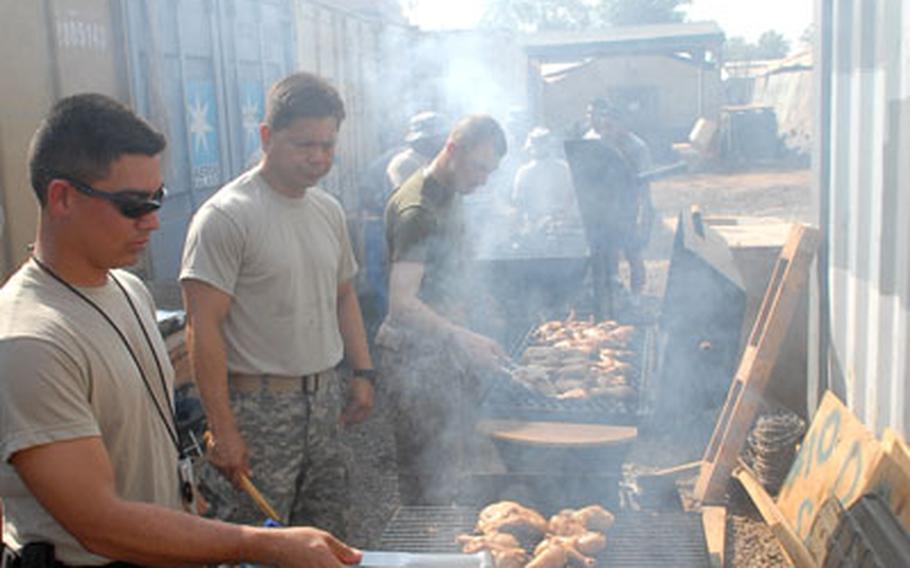 The grills on Camp Lemonier in Djibouti were working on Christmas Day as members of 1st Battalion, 294th Infantry Regiment, Guam Army National Guard, prepare a Christmas barbecue. The holiday feast was expected to feed hundreds of the U.S. Servicesmembers spending the holidays in Africa.