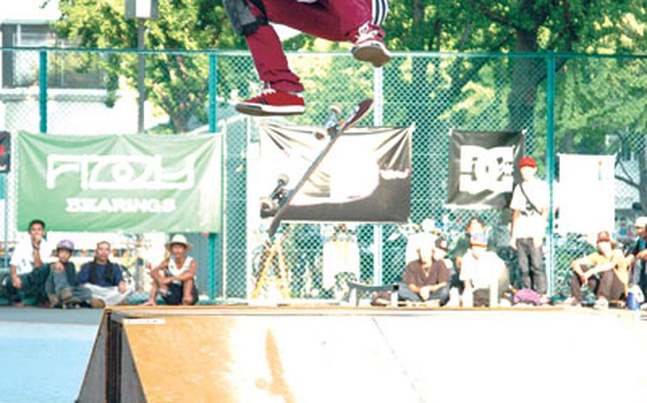 Dylan Thompson, a seventh-grader at Zama American Middle School, does a double kickflip during a Gate Japan skateboard competition Aug. 26 in Nagoya. The 12-year-old amateur is the 2007 series grand champion in the middle and novice classes.