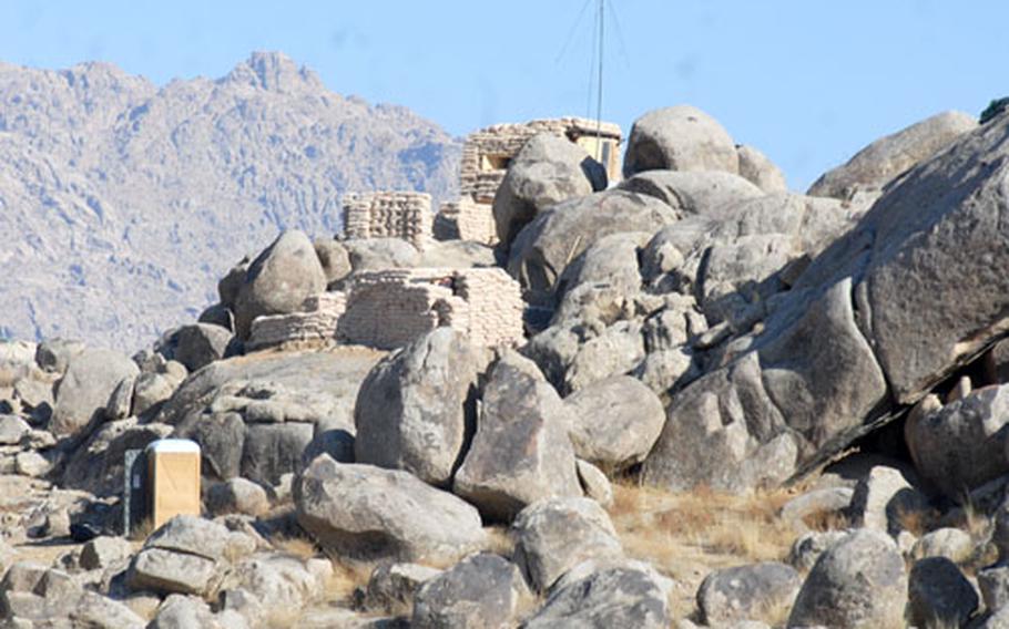 The rock guard, a defensive position at Forward Operating Base Baylough in southern Afghanistan, overlooks several ridgelines, orchards, farmhouses and a small creek. During a firefight there, Staff Sgt. Matthew Ritenour continued to direct troops after being shot in the head.