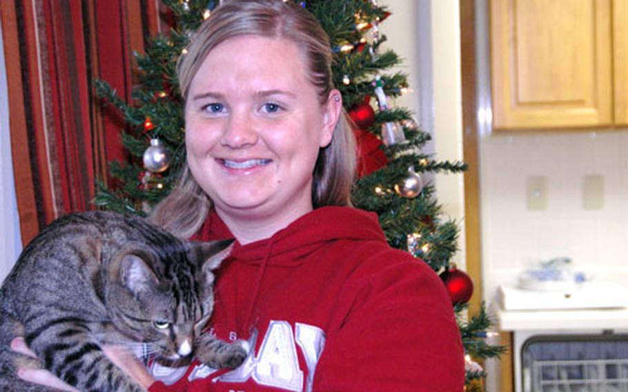 Atsugi’s new housing rule doesn’t affect Navy spouse Rachel Beer. She and her husband live on base because they wanted an apartment that was close to base facilities and to his workplace and that would accept cats.