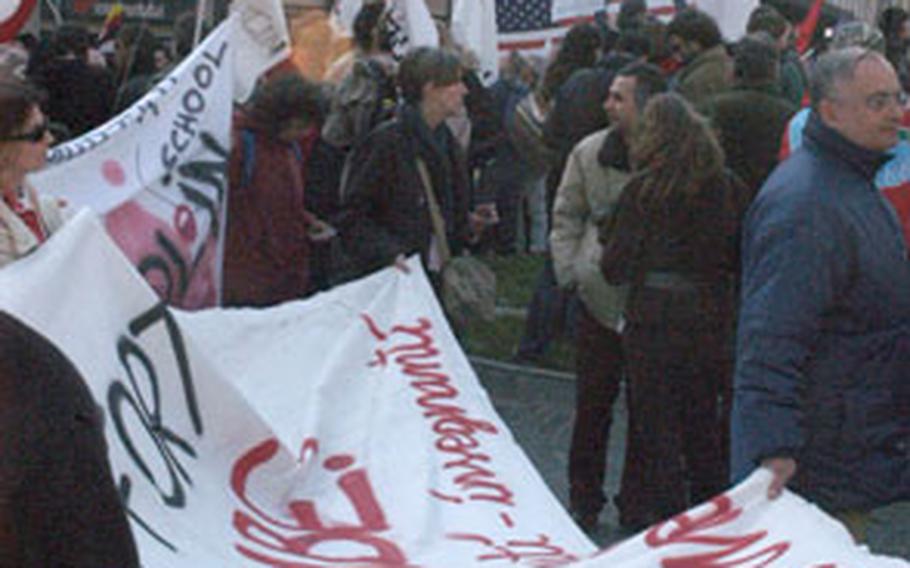 Protesters mill about in a square last February before taking part in a march around Vicenza, Italy, protesting against the U.S. use of the Dal Molin airfield and Italian and American foreign policies.