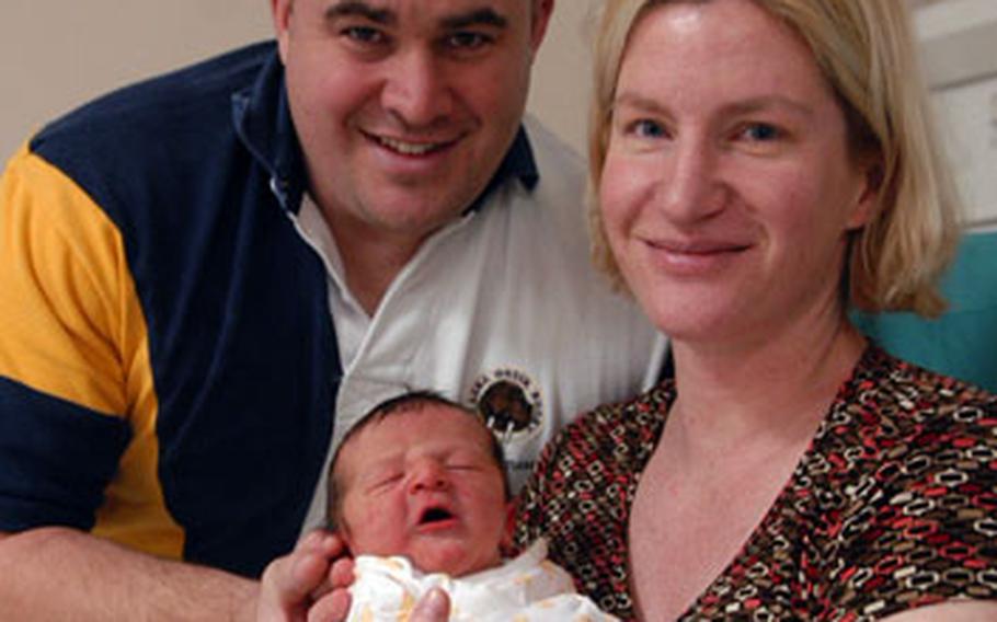 Tech. Sgt. David Delozier, from the 100th Communications Squadron at RAF Mildenhall, and his wife, Julianne, with their newborn baby boy. Bryce Allen Delozier — an 8-pound, 8-ounce bundle of joy — was delivered at 2:02 a.m. on Tuesday.