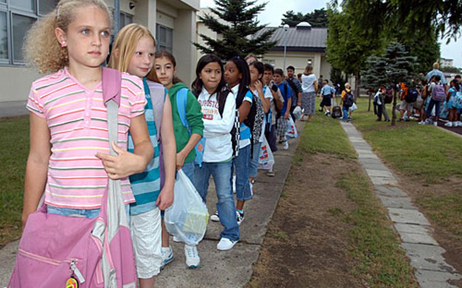 Fifth-grader Lindsay Turvold and her classmates line up outside Sollars Elementary School at Misawa Air Base, Japan, on Aug. 27, the first day of school. Both of Misawa&#39;s elementary schools saw their enrollment decline this school year, echoing a trend at DODDS schools across Japan and Okinawa.