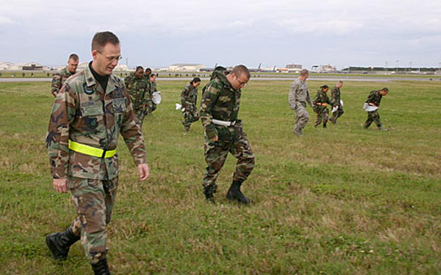 More than 500 other servicemembers cleaned their units&#39; maintenance areas and parking lots at the same time.